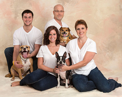 family photo with dogs